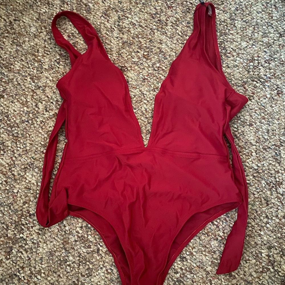 NWT red one piece size large